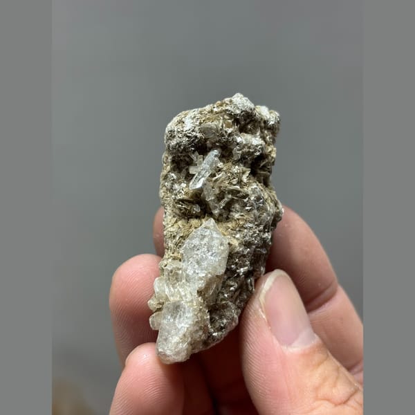 Quartz crusted with silvery mica from Xuebaoding, Sichuan — alternate view