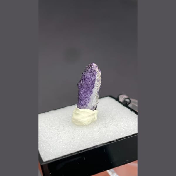 Deep purple fluorite coating a quartz point from Inner Mongolia — alternate view