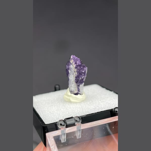 Deep purple fluorite coating a quartz point from Inner Mongolia — alternate view