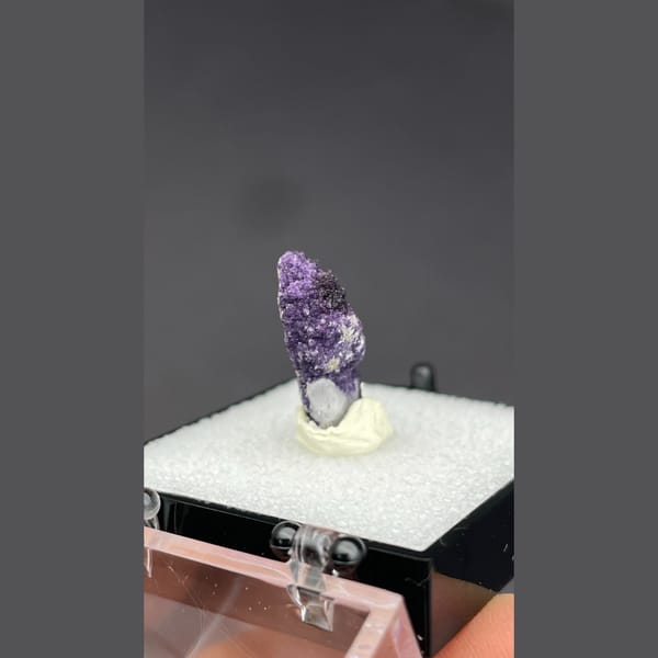 Deep purple fluorite coating a quartz point from Inner Mongolia — detail view