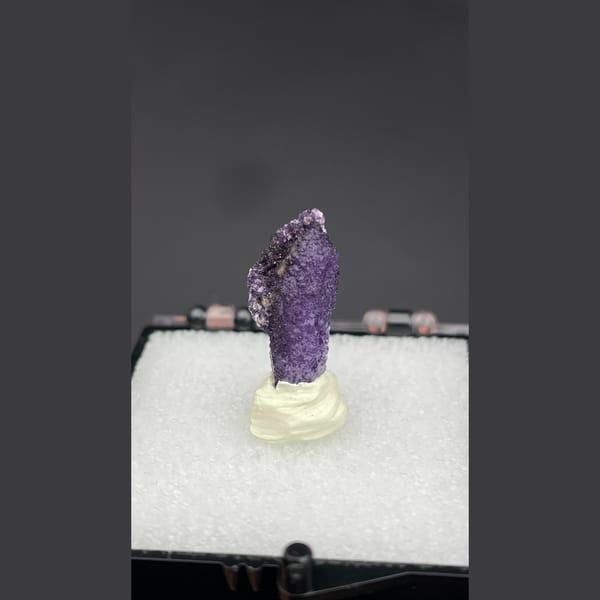 Deep purple fluorite coating a quartz point from Inner Mongolia — detail view