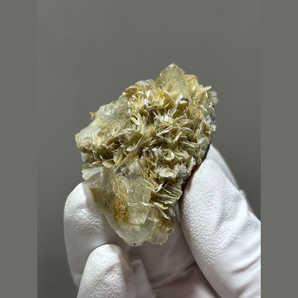 Aquamarine with golden mica from Xuebaoding, Sichuan — alternate view