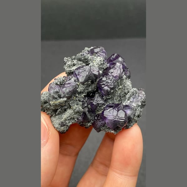 Deep violet blue triangular fluorite from Fujian — complete view