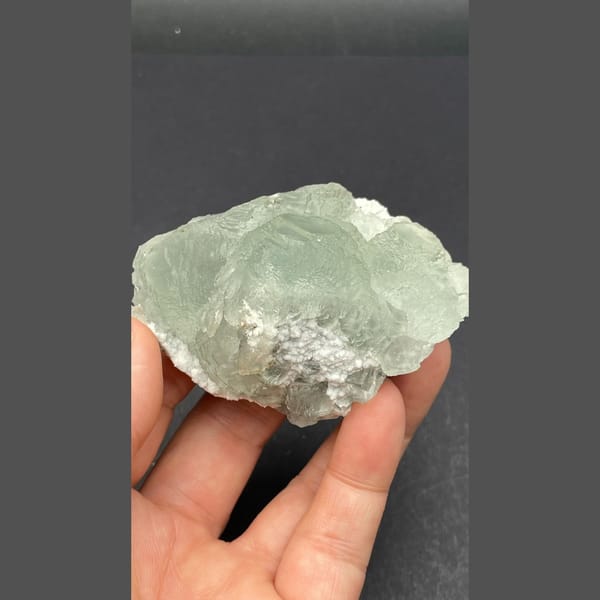 Pale green fluorite plate on quartz from Guangdong — complete view