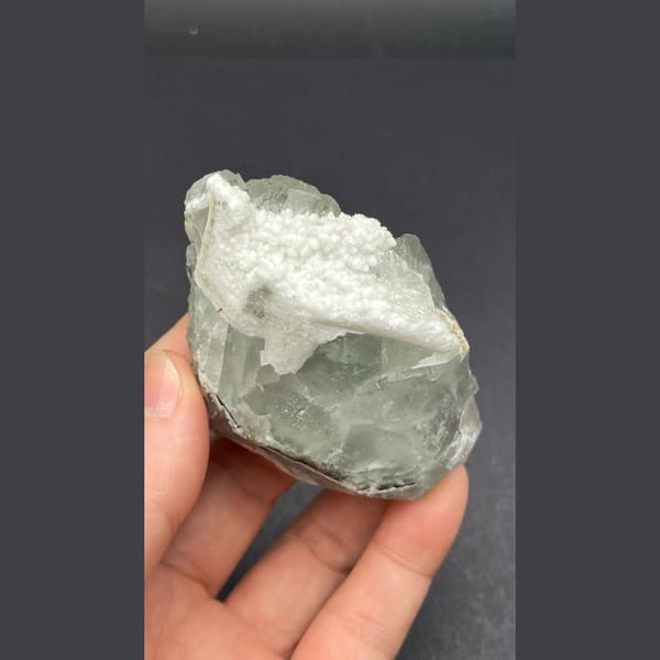 Pale green fluorite plate on quartz from Guangdong — detail view