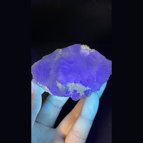 Pale green fluorite plate on quartz from Guangdong — detail view