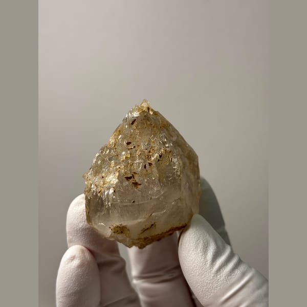 Etched yellowish double-terminated quartz floater from Yunnan — alternate view