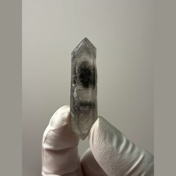Slender clear double-terminated quartz from Sichuan — alternate view