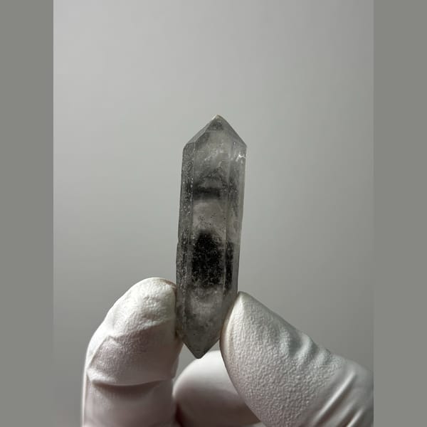 Slender clear double-terminated quartz from Sichuan — alternate view