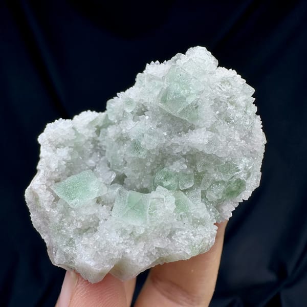 Pale green octahedral fluorite on white quartz from Inner Mongolia — complete view