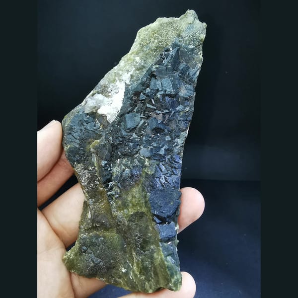 Black and green andradite with high-temperature quartz — complete view