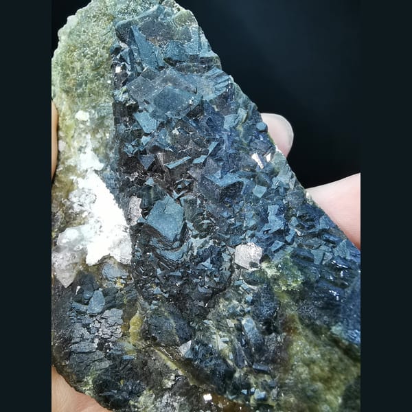 Black and green andradite with high-temperature quartz — alternate view