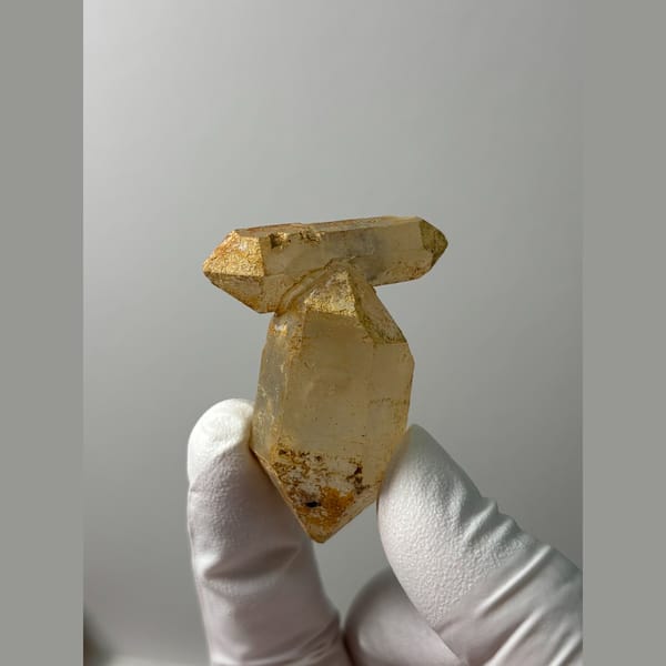Multi-terminated quartz with weathered iron-stained cap from Yunnan — complete view