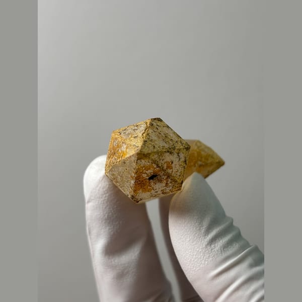 Multi-terminated quartz with weathered iron-stained cap from Yunnan — alternate view