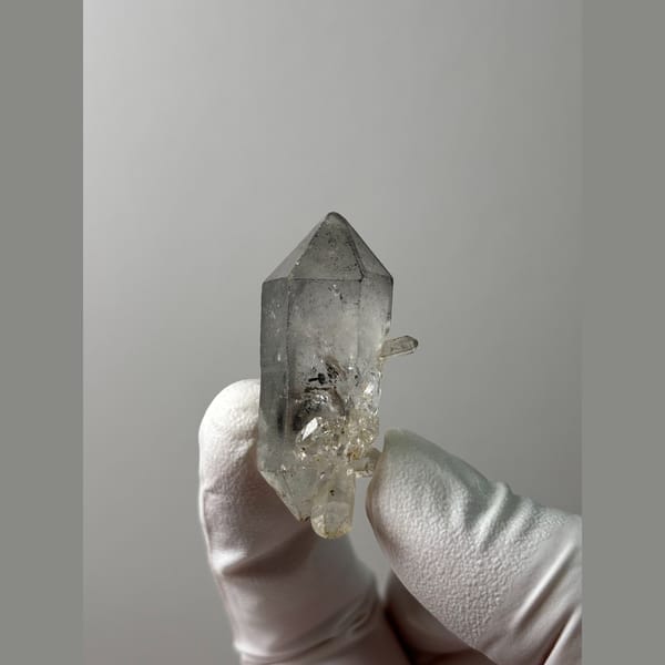 Clear double-terminated quartz with sketch-like markings from Yunnan — alternate view