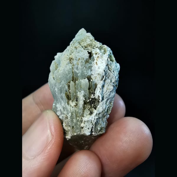 Etched grey-green quartz cluster with calcite — alternate view