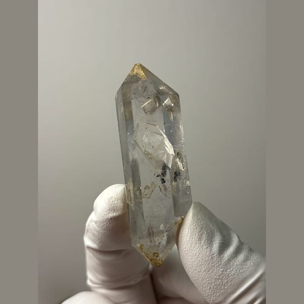 Clear double-terminated quartz with growth marks from Yunnan — alternate view