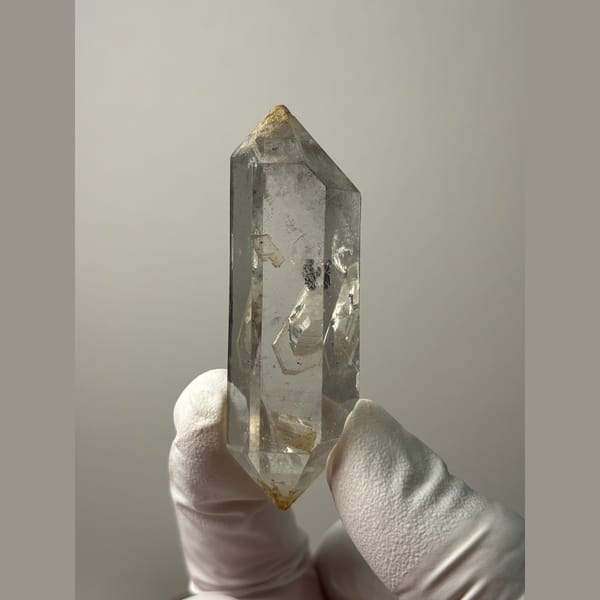 Clear double-terminated quartz with growth marks from Yunnan — detail view