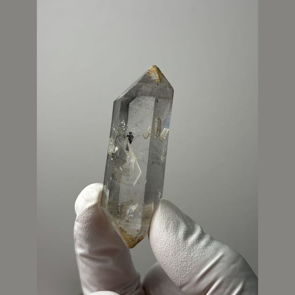 Clear double-terminated quartz with growth marks from Yunnan — detail view