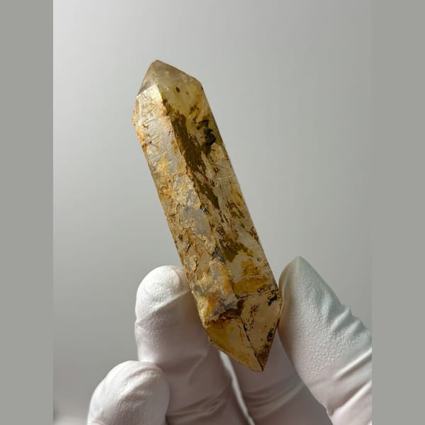 Long golden iron-stained quartz from Yunnan — alternate view