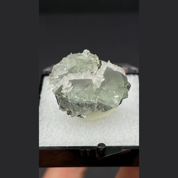 Pale green fluorite with bladed calcite from Hunan — alternate view