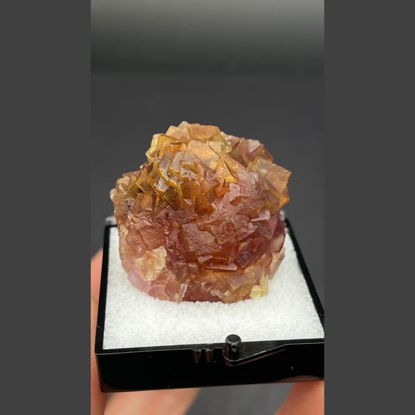 Amber brown fluorite cluster from Henan — alternate view