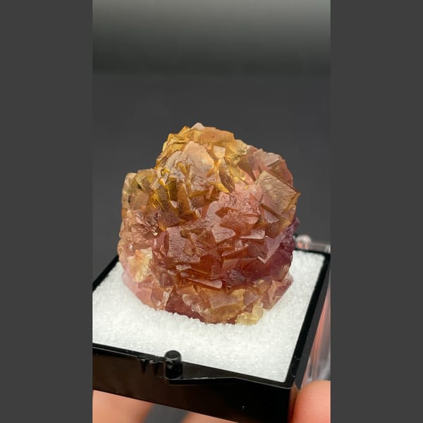 Amber brown fluorite cluster from Henan — alternate view