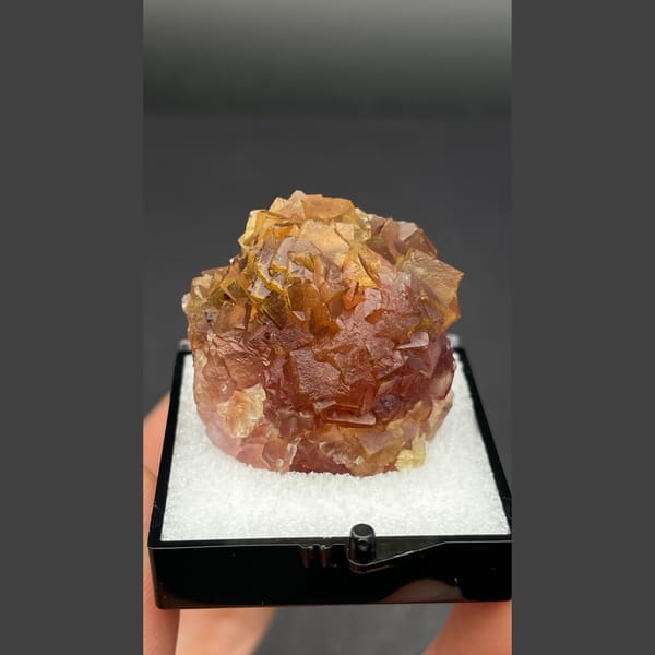 Amber brown fluorite cluster from Henan — detail view