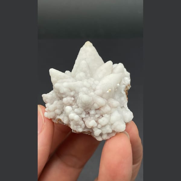 Chunky tan calcite cluster from Yunnan — alternate view