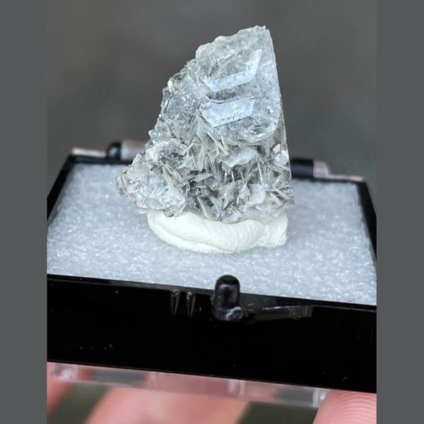 Stacked pale blue aquamarine with mica from Xuebaoding — complete view