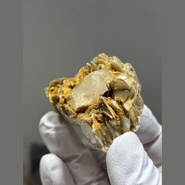 Aquamarine with golden mica sprays from Xuebaoding, Sichuan — alternate view