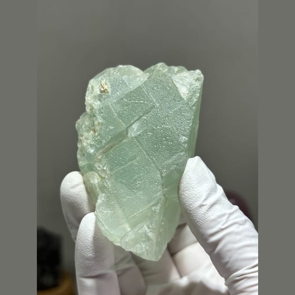 Pale mint-green fluorite from Xuebaoding, Sichuan — complete view
