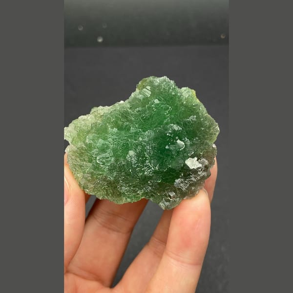Vivid green stepped fluorite cluster from Henan — complete view