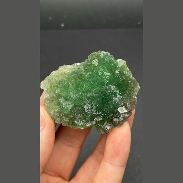 Vivid green stepped fluorite cluster from Henan — alternate view