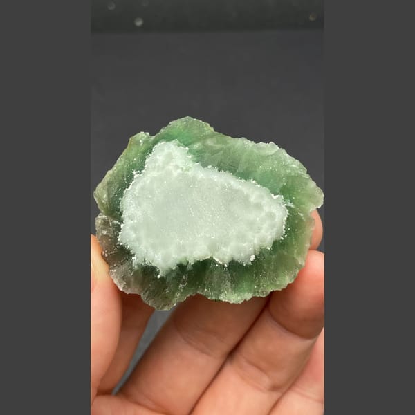 Vivid green stepped fluorite cluster from Henan — detail view