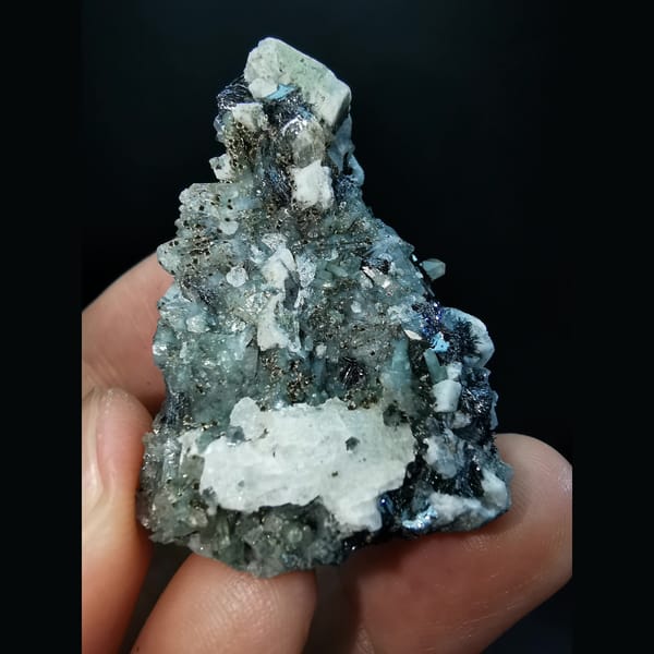 Dolomite with specular hematite, goethite, quartz and calcite — alternate view