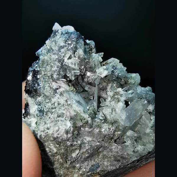 Dolomite with specular hematite, goethite, quartz and calcite — detail view