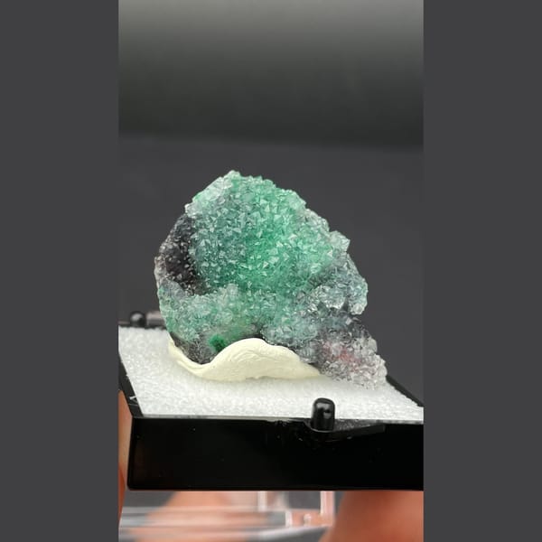 Small quartz cluster with green malachite inclusions from Congo — alternate view