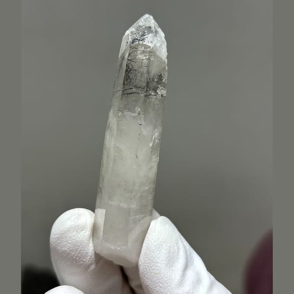 Slender tip-chipped Xuebaoding quartz — alternate view