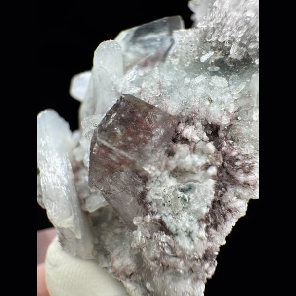 Apophyllite with Red Inclusions India 6.0 cm — detail view