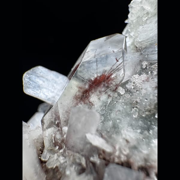 Apophyllite with Red Inclusions India 6.0 cm — detail view