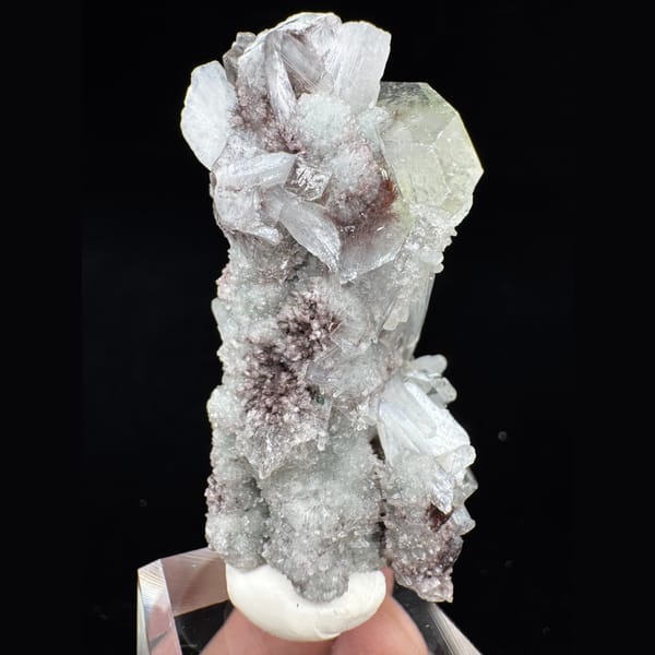 Apophyllite with Red Inclusions India 6.0 cm — detail view