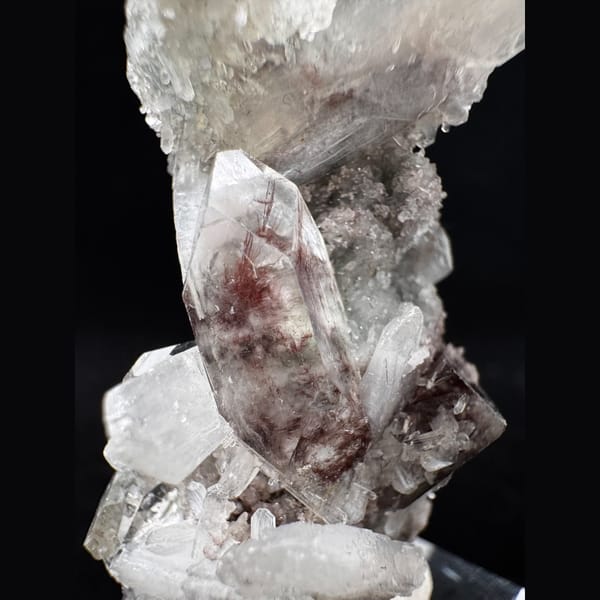 Apophyllite with Red Inclusions India 6.0 cm — detail view