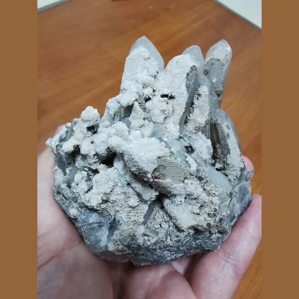 Quartz cluster with calcite flowers — complete view