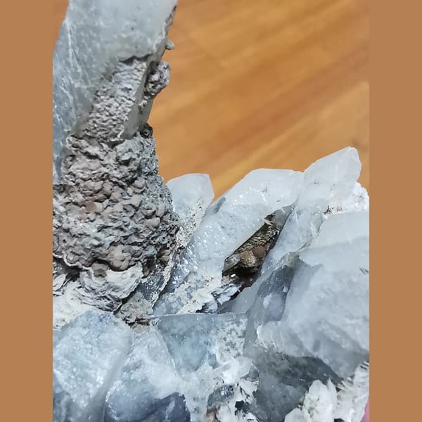 Quartz cluster with calcite flowers — detail view