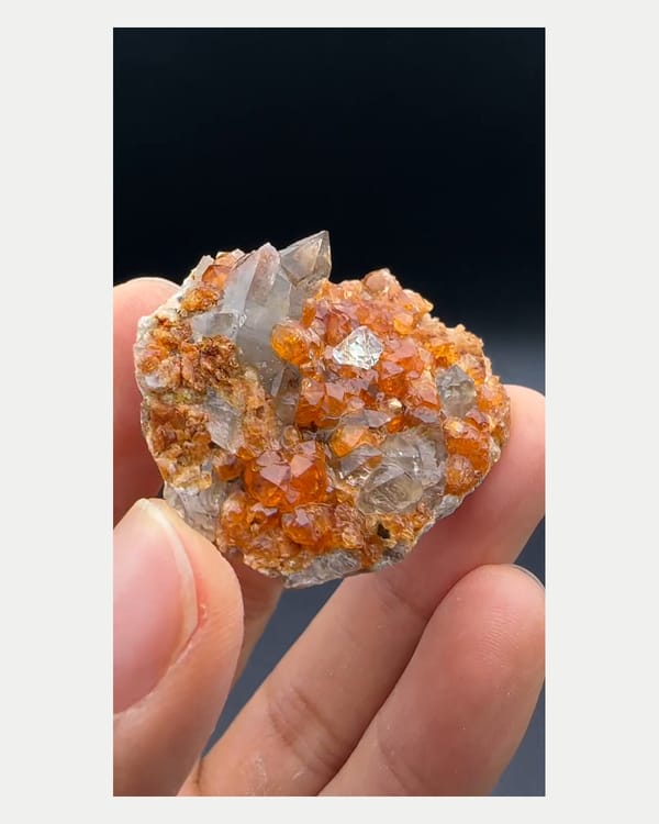 Complete front view of Yunxiao fluorite spessartine and smoky quartz