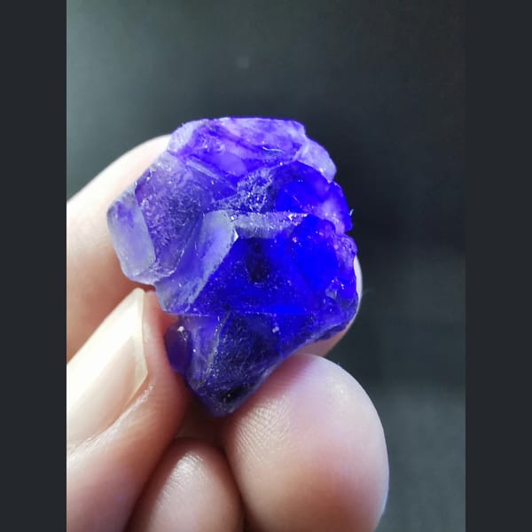 Small purple fluorite cluster — detail view