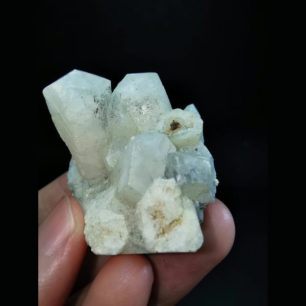 Columnar calcite cluster with etched tips — alternate view