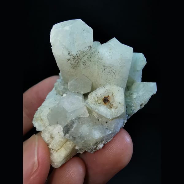 Columnar calcite cluster with etched tips — detail view