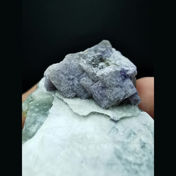 Purple-green fluorite with calcite plates — complete view